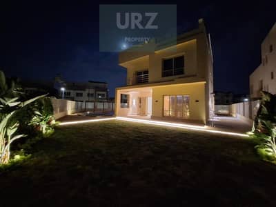 Corner townhouse 3 floors in villas only phase with prime garden view on Suez Road near Madinaty Future City and New Cairo