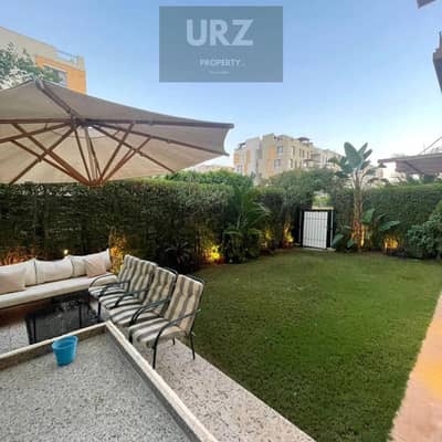 شقة ارضي بجاردن 318م و مدخل خاص هتقدر تستمتع فيو فتوح علي greenery بخصم فوري للبيع علي طريق السويس بالقرب AUC التجمع الخامس وابراج SPINE بجوار مدينتي