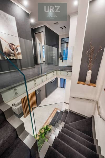 Luxury corner townhouse villa with lake view at a special price directly on Suez Road near Madinaty The Spine Eastvale SODIC and Mivida Gardens