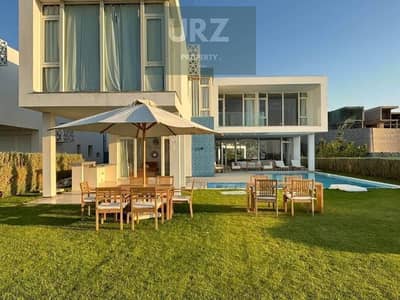 علي خليج راس الحكمة لاول مرة فيلا luxury صف اول علي البحر علي Natural lagoon في مدن الساحل الشمالي بالقرب مراسي  وسول ومرسي بغوش والماظة باي للبيع