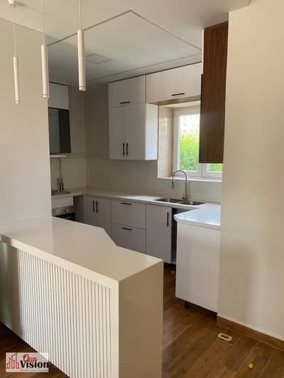 Townhouse for sale in Alkarma Residence Compound in Sheikh Zayed, a prime location in the sixteenth district next to Mazar Mall, 250m buildings, 350m garden land area with a high elevation.