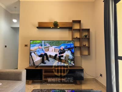 Apartment ultra modern finishing with full Furniture’s under market price very prime location near to The American university In new Cairo near mall .