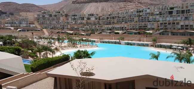 صف أول لاجون شاليه بحديقة للبيع في المونت جلالة