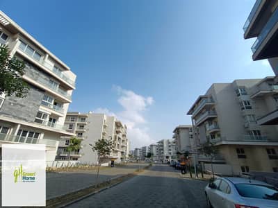 Ready to move  Under market price   Apartment for sale In Mountain view iCity New Cairo  Side view club   Including Club membership and parking