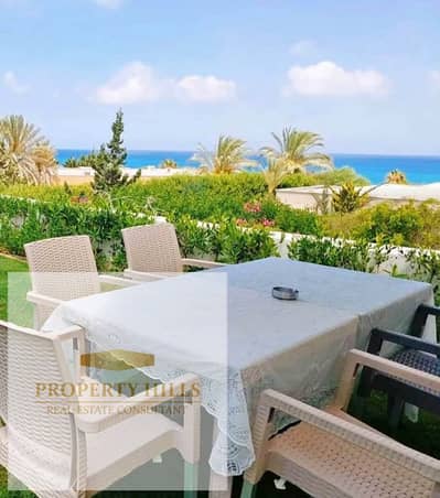 A fully finished chalet with a view of the sea next to Silver Sands and Almazah Bay in a very upscale village