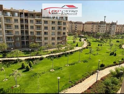 A luxury apartment in Madinty with an old reservation on the ground floor with a garden, Talaat Mustafa