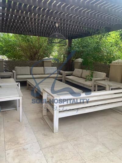 Ground Floor Studio for Sale in The Village New Cairo 88 sqm Garden Fully finished and Furnished