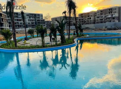 corner apartment for sale 2bedrooms prime location open view on water fitured in compound palm hills new cairo next to mountain view icity
