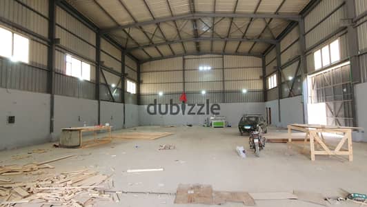 Warehouse/workshop (steel-frame structure) for rent in the Fifth Settlement Industrial Zone; suitable for engineering or metal fabrication activities.
