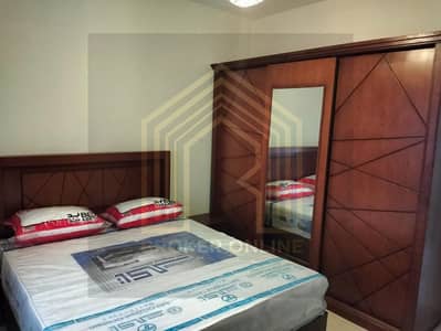 For rent, a furnished apartment in October Gardens [Italian District compound] at a bargain price