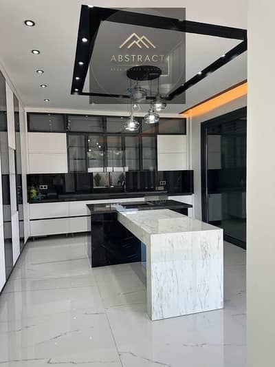 Apartment for Sale in Shalia, Taj City – Fifth Settlement  Corner unit with a direct view of Suez Road an excellent opportunity with a 50% discount
