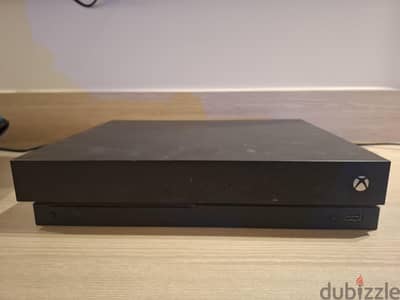 xbox one x with 2 series x controllers