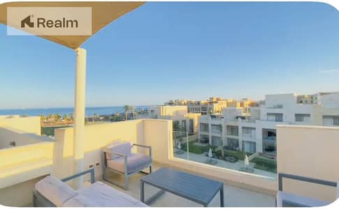 Furnished apartment with direct sea and pool views; includes ACs