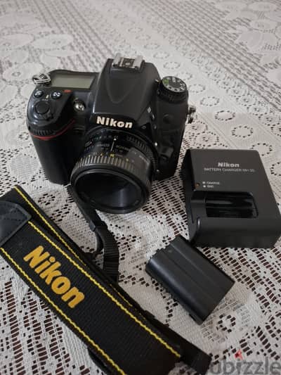 نيكون d7000 مع عدسة 50ملى