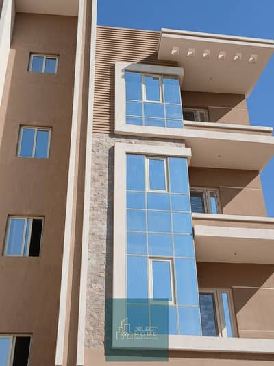 The best price for a ground apartment with a garden in بيت الوطن in the Fifth Settlement, 120m + 45m front garden in the first neighborhood, first row on a main street, Northern location, and installment plan for two years