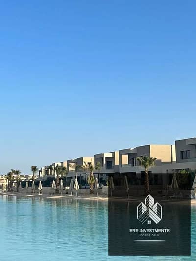 Ground floor chalet with garden for sale, first row on the lagoon, finished with air conditioning and kitchen, in Azha Madar, North Coast,