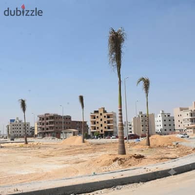ارض للبيع واجهه خطوات للرئيسي و بالم هيلز في بيت الوطن التجمع الخامس القاهره الجديده