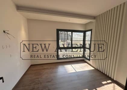 Apartment with garden  Direct Lagoon View-Fully Finished-for sale Prime Location inside Palm Hills New Cairo