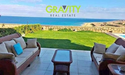 Chalet for sale, first row, double view on the sea and the lagoon, finished with air conditioning and kitchen in Tallel Village, Ain Sokhna.