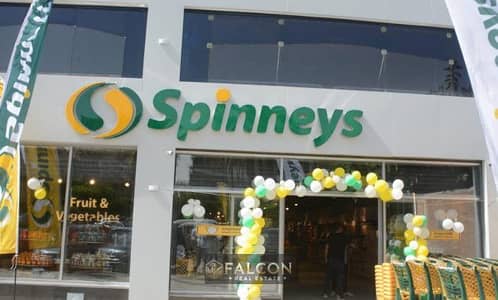 محل تجاري ارضي متاجر بالفعل بعائد ايجاري سنوي 15 مليون لبراند هايبر ماركت  Spinneys دايركت علي شارع طه حسين  و بجوار المستشفي السعودي الالماني