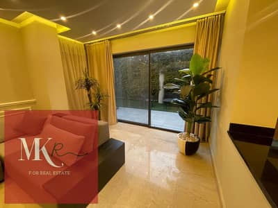 For rent, a ground floor apartment in Garden, 130 meters, furnished, ultra-super lux finishing, immediate delivery in Lake View compound, near the American University and New Cairo's 90th Street.