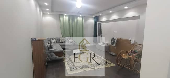 For rent, a super lux furnished apartment in Al Rehab next to the eastern market, garden view.