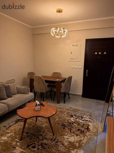 76 sqm furnished apartment for rent in Madinaty (B8): 2 bedrooms, high-end finishes, and modern furniture.