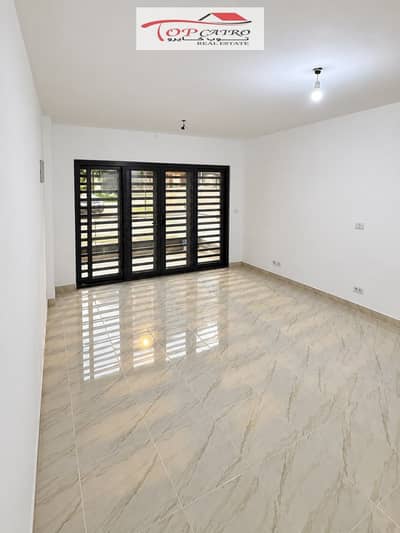 Apartment for sale in installments in Madinaty B15 with an area of 100m ground floor without a garden