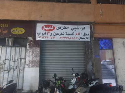 For business opportunity seekers - for sale - a shop (50 meters, 3 doors, finished) in a distinguished location at the corner of two streets in Miami near Khalid bin Al-Walid Street with a sea view, finished and equipped
