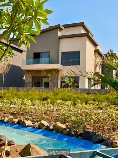 Townhouse for sale corner ** ready to move ** with landscape view opposite al rehab in Creek Town New Cairo minutes from taj city and the airport.