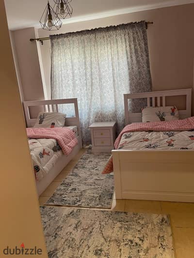 For sale, Madinaty B3, 100 meters apartment in a garden, with special finishing, excellent location, consisting of two bedrooms + reception + kitchen + bathroom + terrace