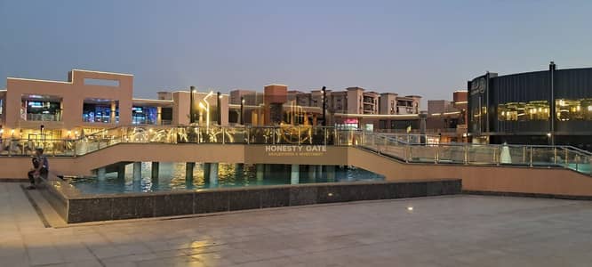 Commercial Shop for Sale in East Court, 100 sqm Indoor + 100 sqm Outdoor, EGP 119K Monthly Rental Income, Lease Until May 2027