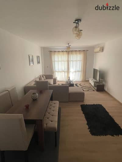 A stunning 3-bedroom hotel-style apartment with a view of Wide Garden, fully furnished and available for rent in Madinaty.