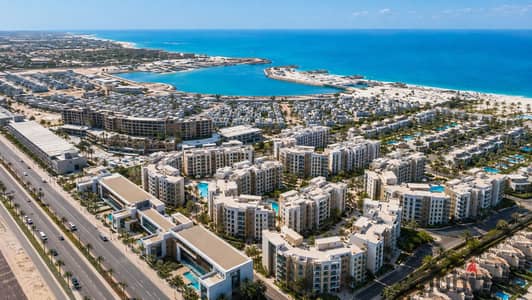 Adjacent to Marina 1, a chalet with 3 rooms directly on the sea in Al-Alamein, fully furnished with air conditioning, offering a limited-time offer.