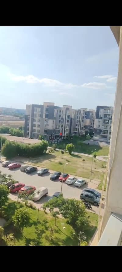 For rent, an apartment of 130 meters, fifth floor, corner, northern side in Dar Misr Compound, 16th district, Sheikh Zayed