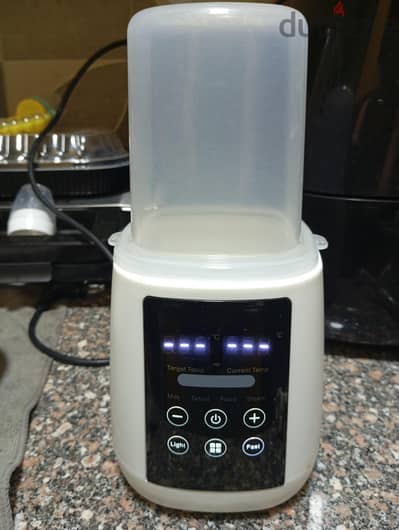 Baby bottle steriliser and heater
