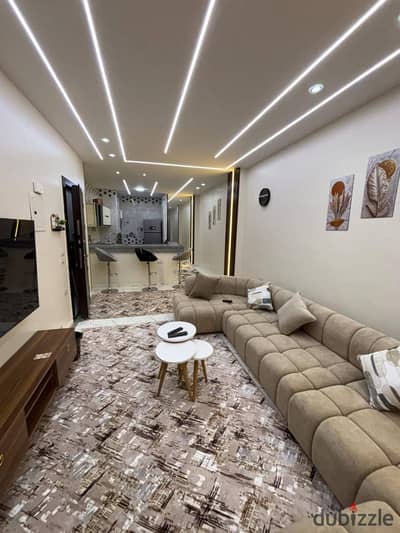  Today's snapshot for connoisseurs | The first resident with the latest finishing and furnishing in 6 October!  An exceptional residential real estate opportunity that won't be repeated! A luxury apartment for annual rent in zero condition with modern furnishings and very elegant custom-made furniture. You're the first to use it!  Location and building: Address: 6 October – Second neighborhood (ا