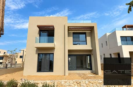 Standalone villa for sale at a great price with an open view of expansive landscaping – immediate delivery in O West Compound.