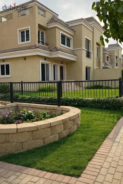 Two-story villa for sale in Sarai Compound with a 50% discount for cash payment, located on the Suez Road and next to Madinaty in the ELM TREEE PARK p