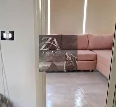 Furnished studio apartment for rent in Stone Residence Compound, Katameya, Cairo, with kitchen and air conditioning.