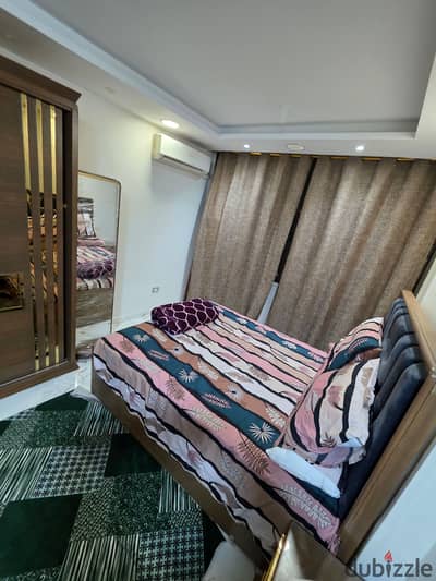 Furnished, air-conditioned hotel-style apartment next to City Stars, available for daily and monthly rent for families. Excellent location in Nasr Cit