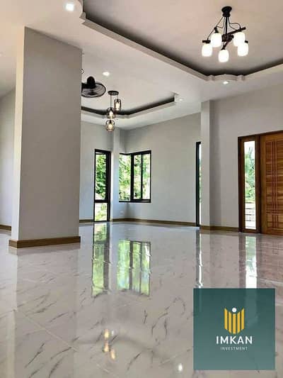 Apartment for sale with a 64% discount—fully finished—requiring a down payment of 490,000 EGP and the balance payable over 15 years. Located in the TA