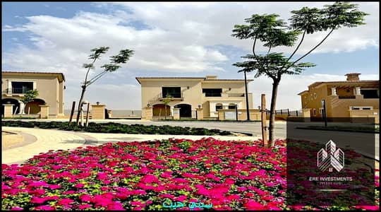 Middle townhouse for sale in City Gate (Avenue), Qatari Diar, Fifth Settlement - finished with air conditioning and kitchen, ready for viewing and imm