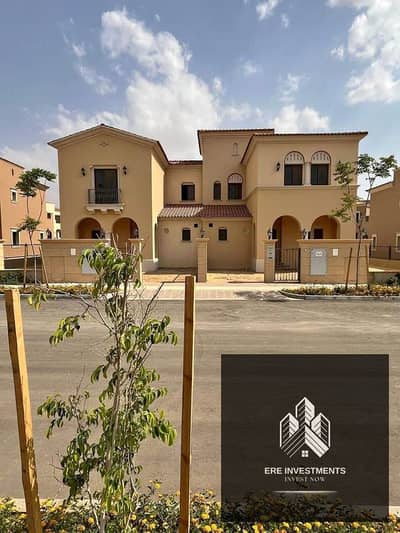 Twin house for sale in (Aven) City Gate Qatari Diar next to Mivida - with installments over the longest payment period - the villa at a bargain price