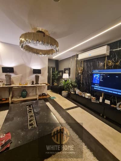 Studio With private Garden ultra modern finishing fully furnished under market price prime location in compound Fifth square New Cairo near to pools .