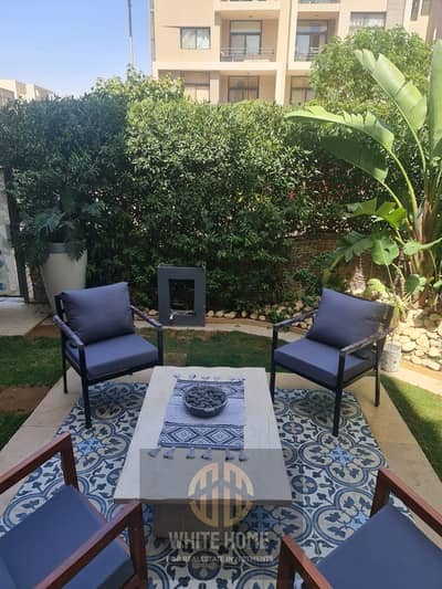 Studio With private Garden ultra modern finishing fully furnished under market price prime location in compound Fifth square New Cairo near to pools .