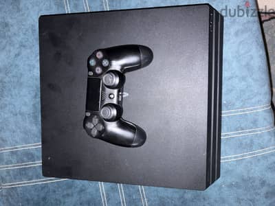 PlayStation 4 pro دراع اوريجنال و العاب متهكر