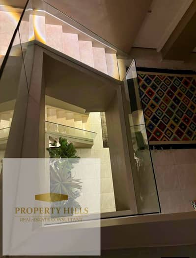 Town Villa for Sale in AZZAR New Cairo  A spacious town villa with a well-designed layout featuring a large number of master bedrooms and a private ga