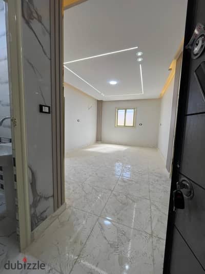 Apartment for sale, First Neighborhood, Block 5, next to Nawwal Al-Dajwi University