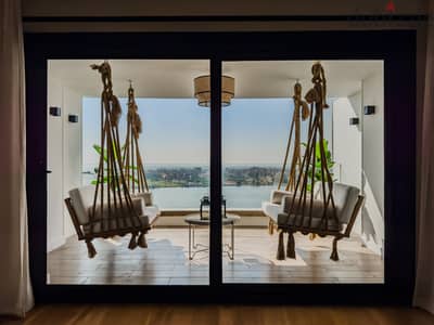 Apartment with a panoramic view of the Nile and the 9 Pyramids